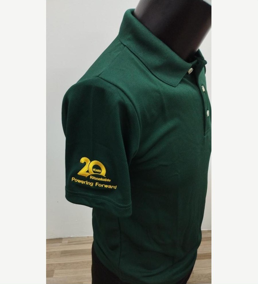 Business polo shirt with embroidered anniversary logo on sleeve